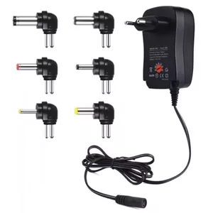 Universāls barošanas bloks CP UCH1 12/30W, 3-12V ar USB pieslēgvietu un 6 maināmiem uzgaļiem