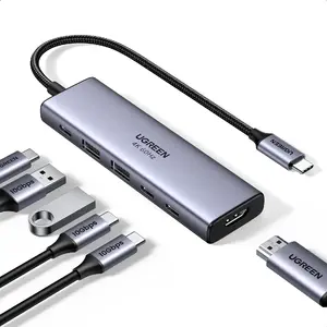 Ugreen USB-C centrmezgls 6-in-1 ar HDMI, 2x USB-A 3.2, 2x USB-C 3.2 un 100W Power Delivery pelēkā krāsā